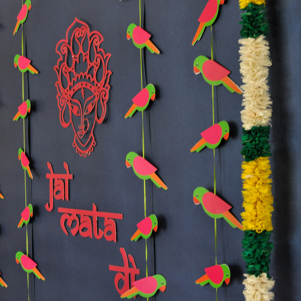 Traditional parrot garlands for wedding mandap decor